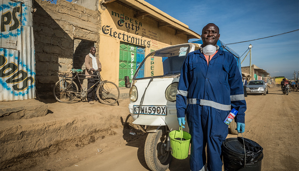 Sanivation-Worker-Collecting-Waste