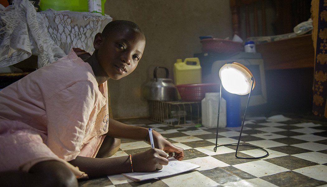 World Social Justice can only be achieved through innovative solutions like our BrightLife program, which provided the lamp this child is using