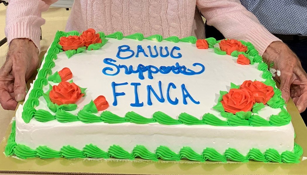 Ellie-Holding-FINCA-Cake