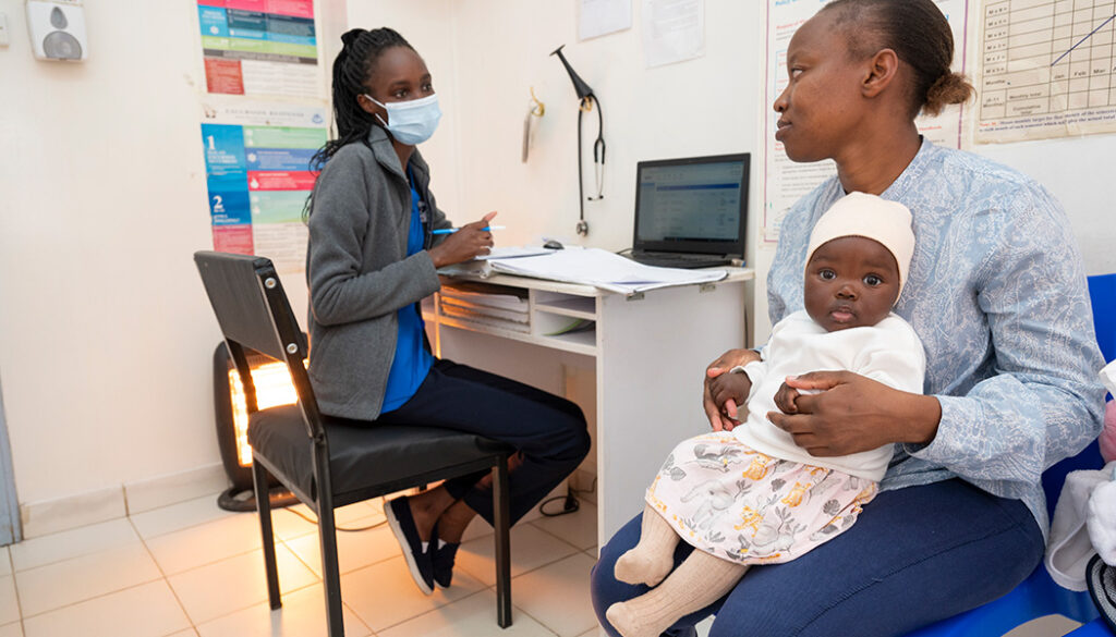 Monica and Giana meet with a nurse at Penda Health and are happy with the medical care for children Penda provides.